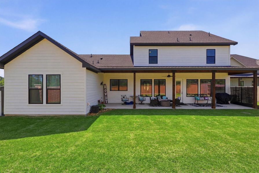 Exterior details and patio area of a home in Magnolia Woods - 70', Magnolia (Image 24).