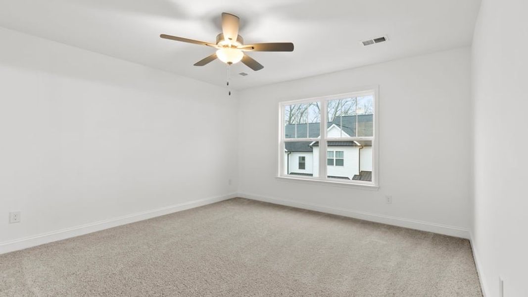 Representative unfurnished interior of a home built from the Interior Unit by D.R. Horton in Pearson Road Townhomes, Easley (Image 26).