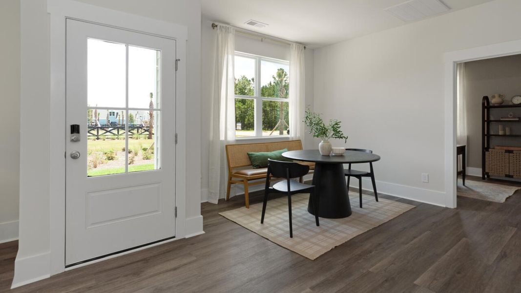 Representative furnished interior of a home built from the TUSCAN II by D.R. Horton in Indigo Preserve Townhomes, Leland (Image 4).
