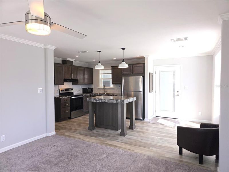Furnished interior view inside a new home in , North Port (Image 9).