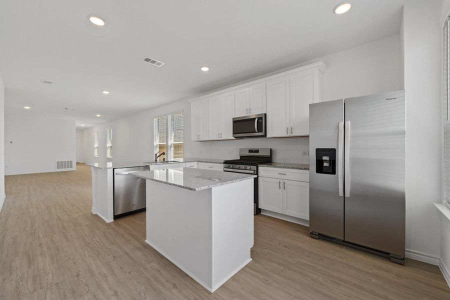 Representative Image Kitchen featuring Whirpool Stainless Steel appliances, 5 burner Gas stove, and granite countertops Representative Image Kitchen featuring Whirpool Stainless Steel appliances, 5 burner Gas stove, and granite countertops