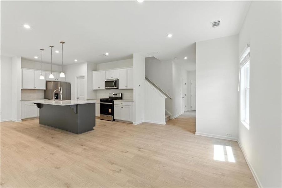 Furnished interior view inside a new home in The View at Groover’s Lake, Lithia Springs (Image 3).