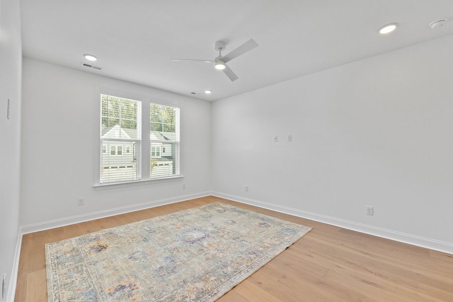 Representative unfurnished interior of a home built from the The Juniper by RobuckHomes in Kennebec Crossing, Angier (Image 87).