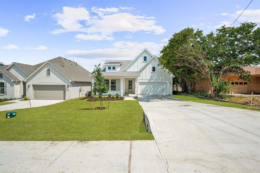 Front exterior of a new home in , Aledo, TX, highlighting curb appeal (Image 21).
