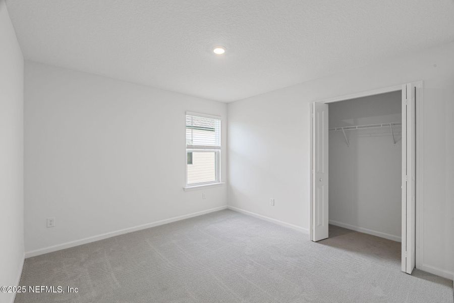 Spacious, unfurnished interior of a new home in Beacon Lake, St. Augustine (Image 27).
