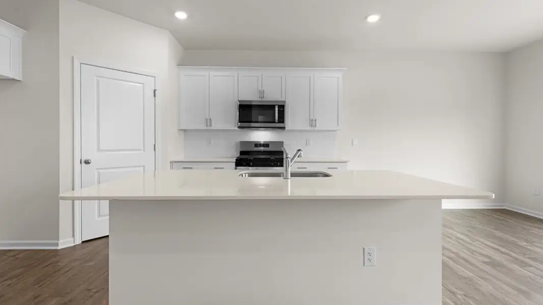 Furnished interior view inside a new home in The Reserve at Prestleigh, Wake Forest (Image 4).