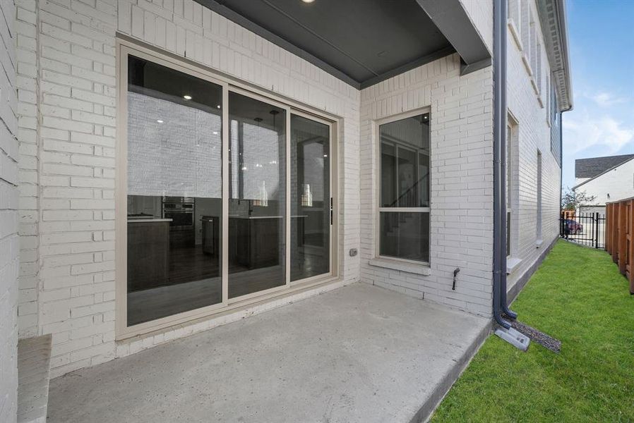 Exterior details and patio area of a home in Fields Villas - Darling Homes, Frisco (Image 4).