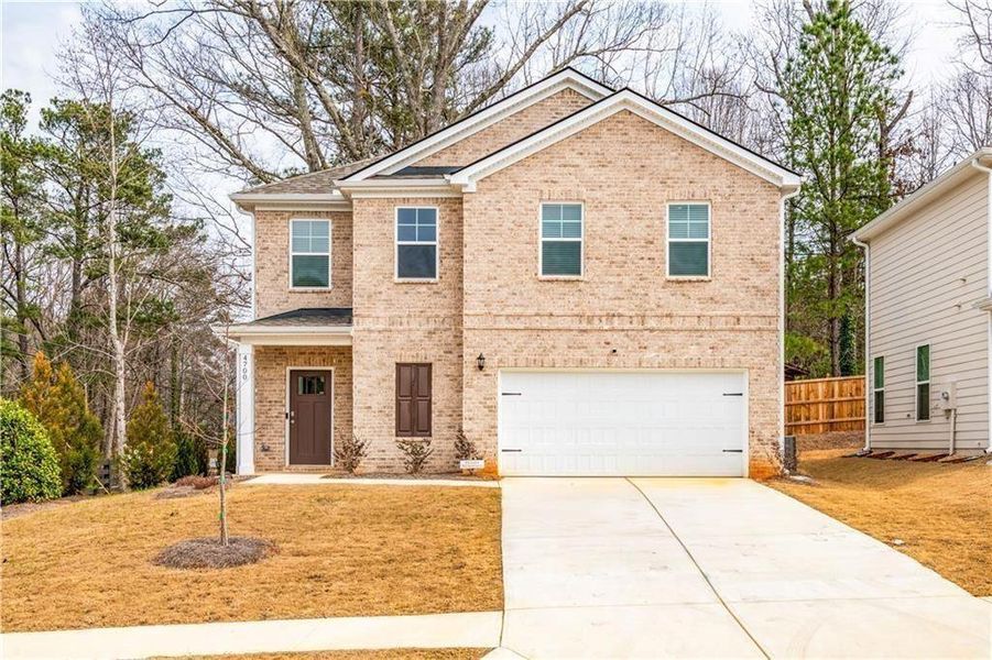 Front exterior of a new home in , Atlanta, GA, highlighting curb appeal (Image 25).