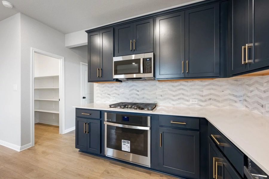 Furnished interior view inside a new home in Berry Creek Highlands, Georgetown (Image 9).