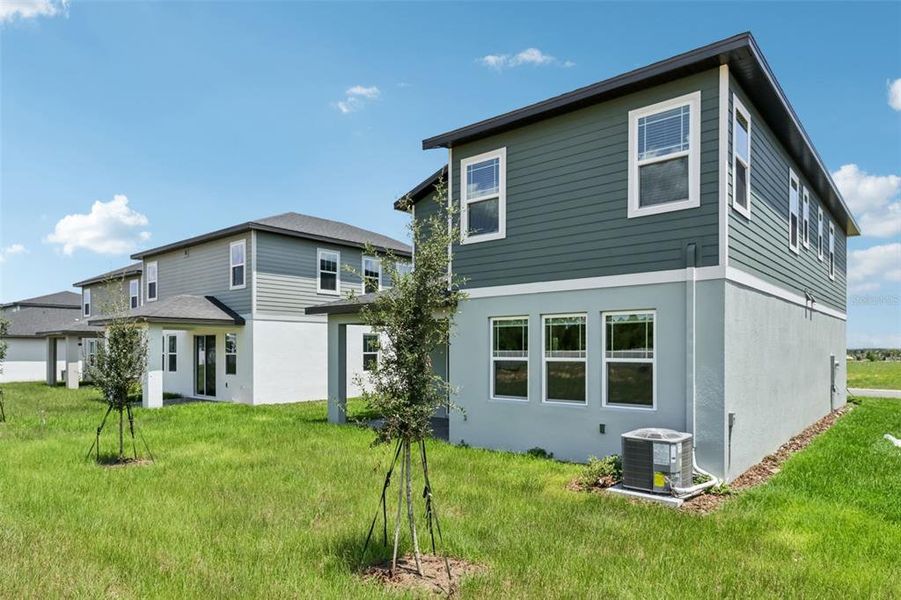 Exterior details and patio area of a home in Cyrene at Minneola, Minneola (Image 25).