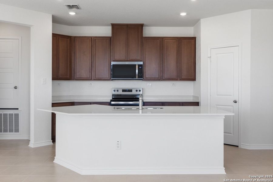 Furnished interior view inside a new home in Legend Heights, New Braunfels (Image 4).