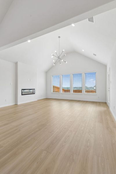 Living Room in the Claret home plan by Trophy Signature Homes – REPRESENTATIVE PHOTO