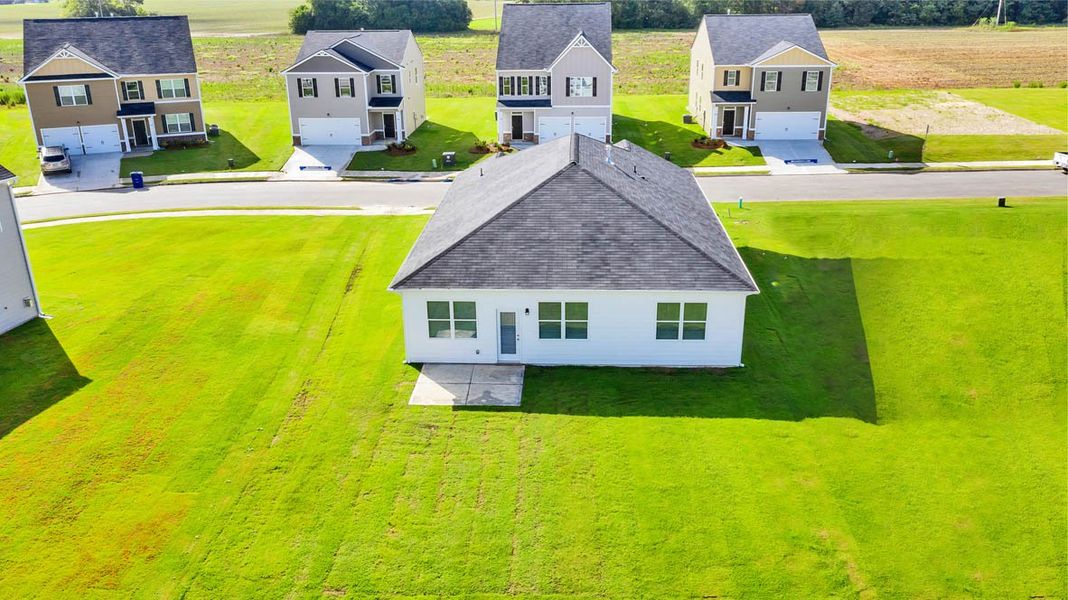 Representative exterior photo of a completed home built from the Aria by D.R. Horton in The Abbey at Trolley Run Station, Aiken, SC (Image 17).