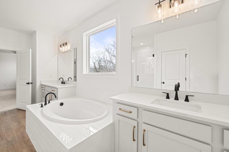 Furnished interior view inside a new home in East Harbor II at Chestatee, Dawsonville (Image 9).