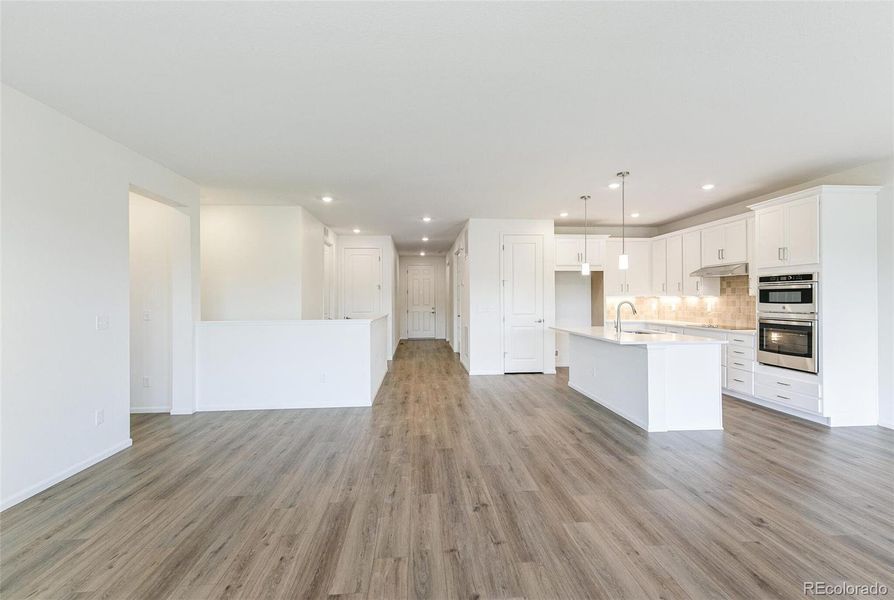 Spacious, unfurnished interior of a new home in Terrain Oak Valley, Castle Rock (Image 26).