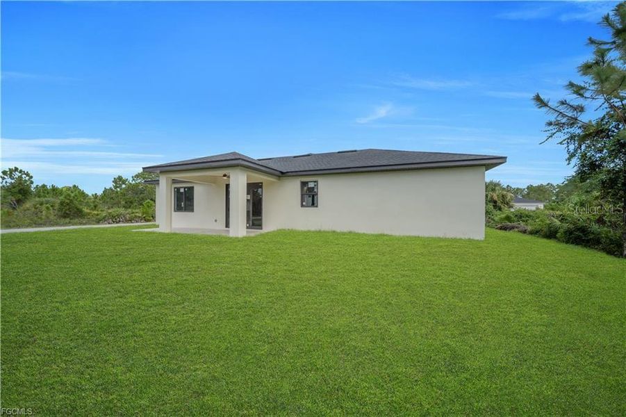 Exterior details and patio area of a home in , Lehigh Acres (Image 32).