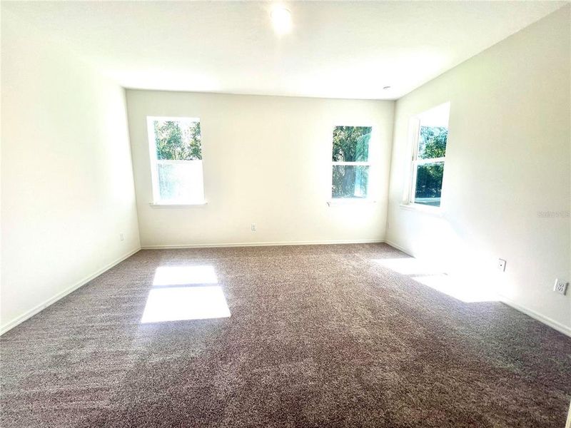 Spacious, unfurnished interior of a new home in Palm Coast: Cornerstone Collection, Palm Coast (Image 21).