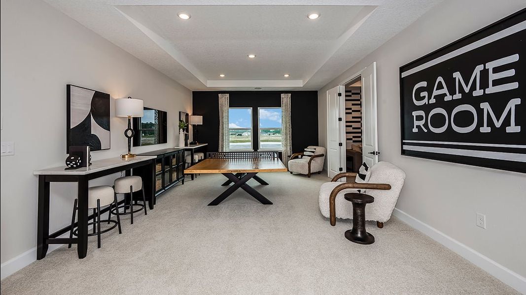 Representative furnished interior of a home built from the Bimini by Taylor Morrison in Ardisia Park, New Smyrna Beach (Image 32).
