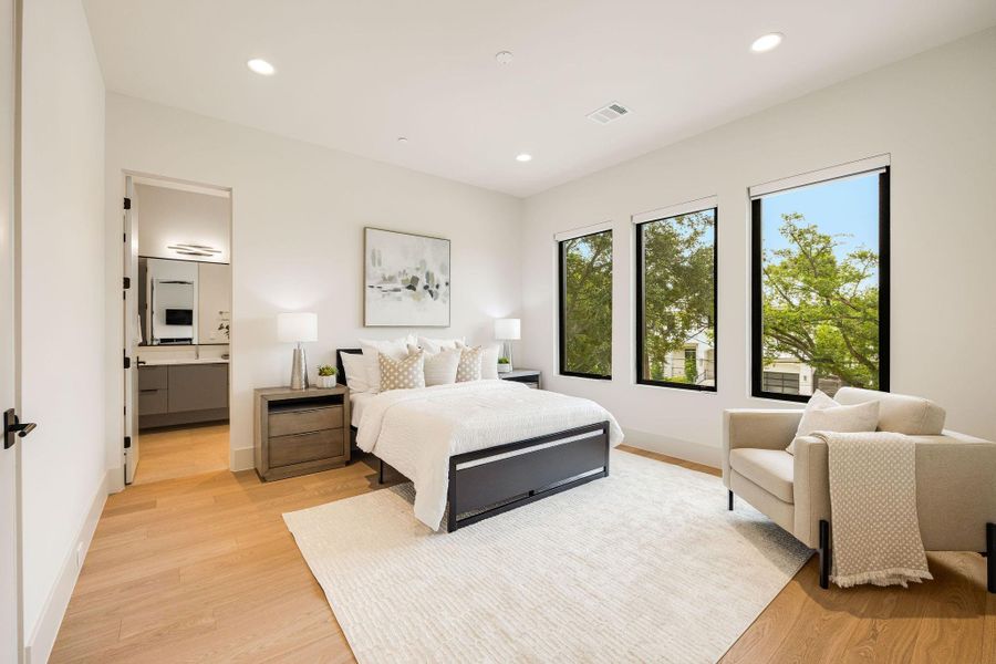 [SECONDARY BEDROOM] Another spacious secondary bedroom with a large walk-in closet.