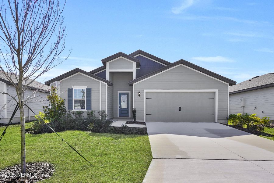 Front exterior of a new home in , Jacksonville, FL, highlighting curb appeal (Image 1). Front exterior of a new home in , Jacksonville, FL, highlighting curb appeal (Image 1).