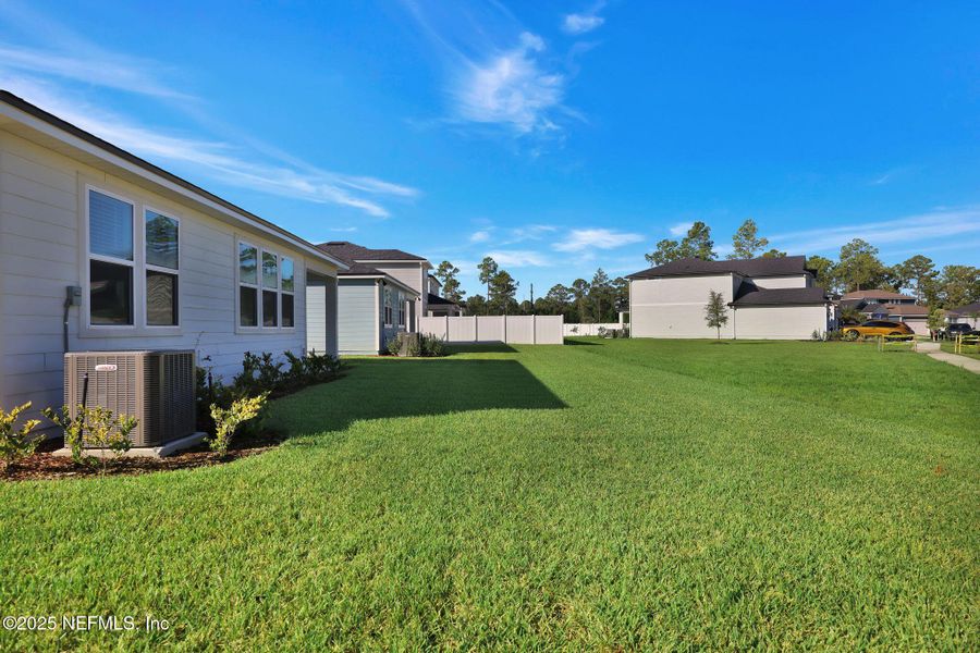 Exterior details and patio area of a home in Bradley Creek, Green Cove Springs (Image 27).