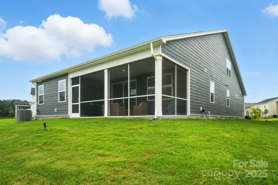 Exterior details and patio area of a home in Waxhaw Landing, Monroe (Image 2).