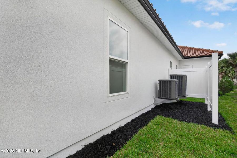 Exterior details and patio area of a home in , St. Johns (Image 38).