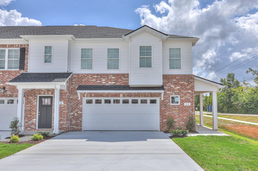Front exterior of a new home in Legacy Preserve, Tullahoma, TN, highlighting curb appeal (Image 1). Front exterior of a new home in Legacy Preserve, Tullahoma, TN, highlighting curb appeal (Image 1).