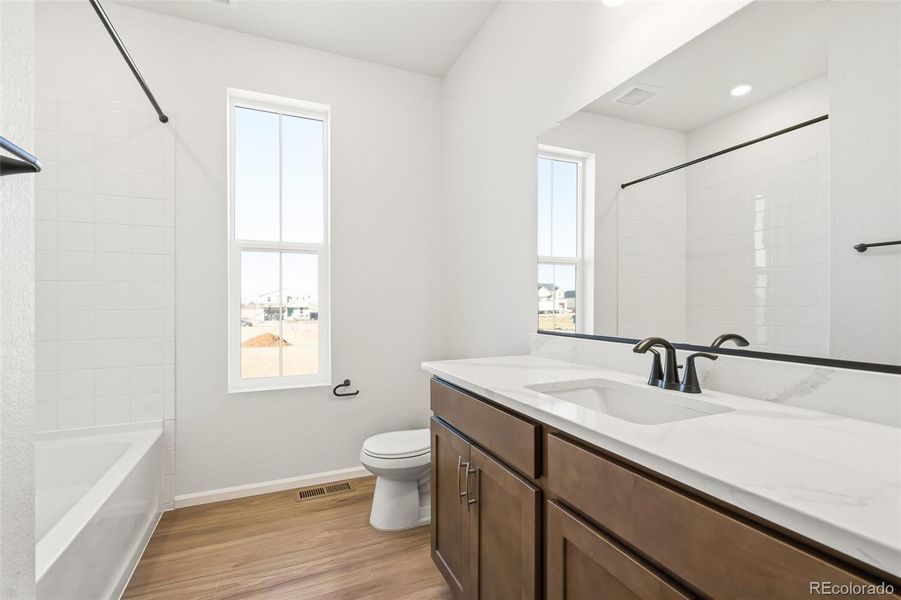 Furnished interior view inside a new home in The Nest Classic at Canyon Creek, Erie (Image 14).