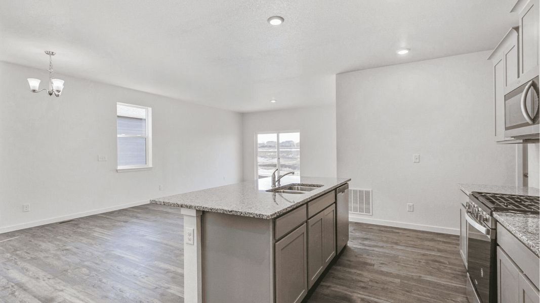 Representative furnished interior of a home built from the Elm by D.R. Horton in Granary, Johnstown (Image 6).