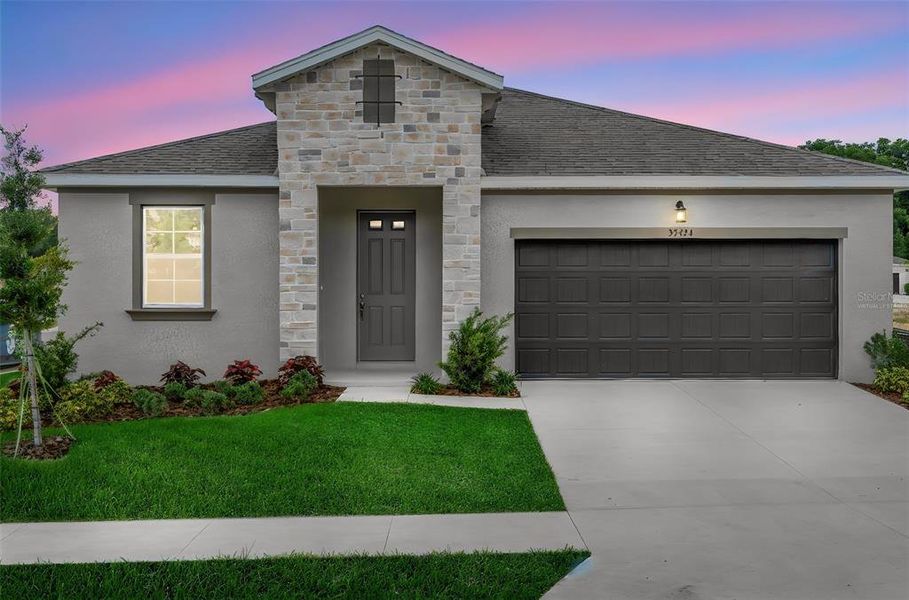 Front exterior of a new home in Tuscan Hills, Dade City, FL, highlighting curb appeal (Image 21).