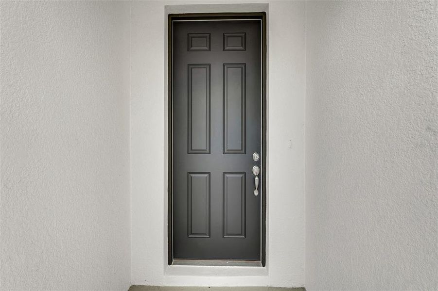 Exterior details and patio area of a home in Tuscan Hills, Dade City (Image 24).