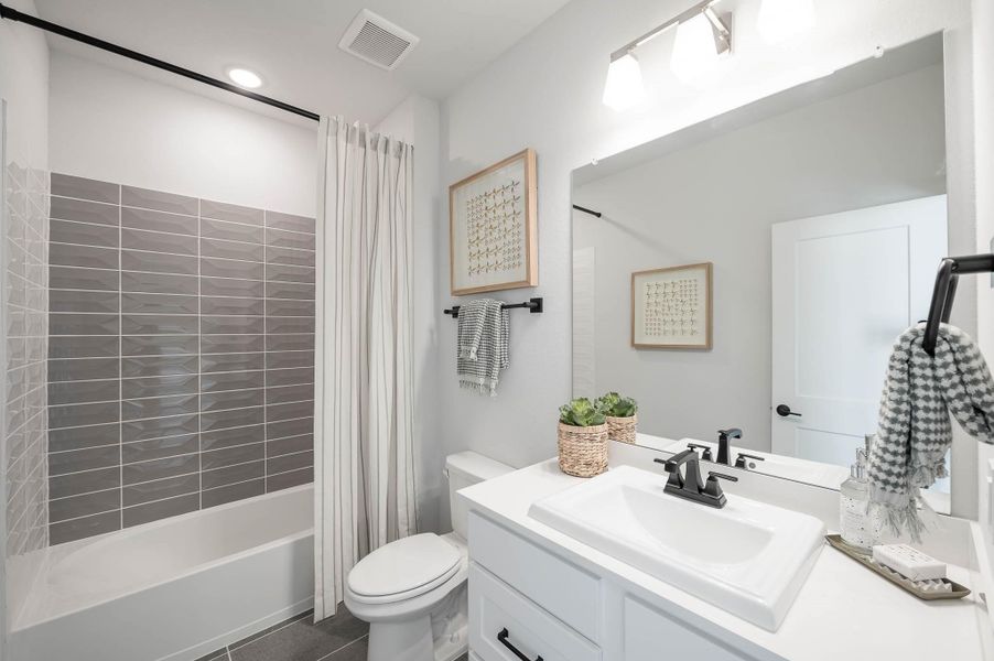 Furnished interior view inside a new home in Bridgeland, Cypress (Image 20).