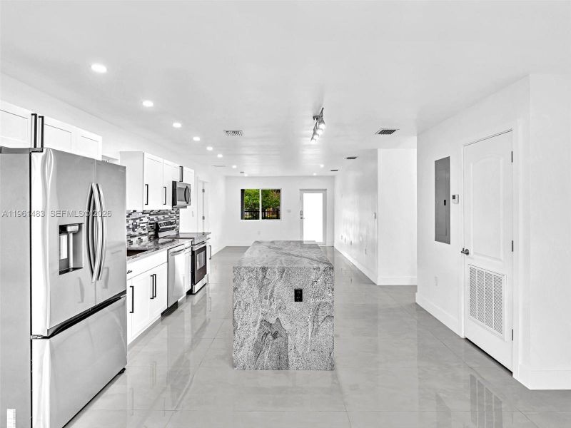 Furnished interior view inside a new home in , North Miami (Image 15).
