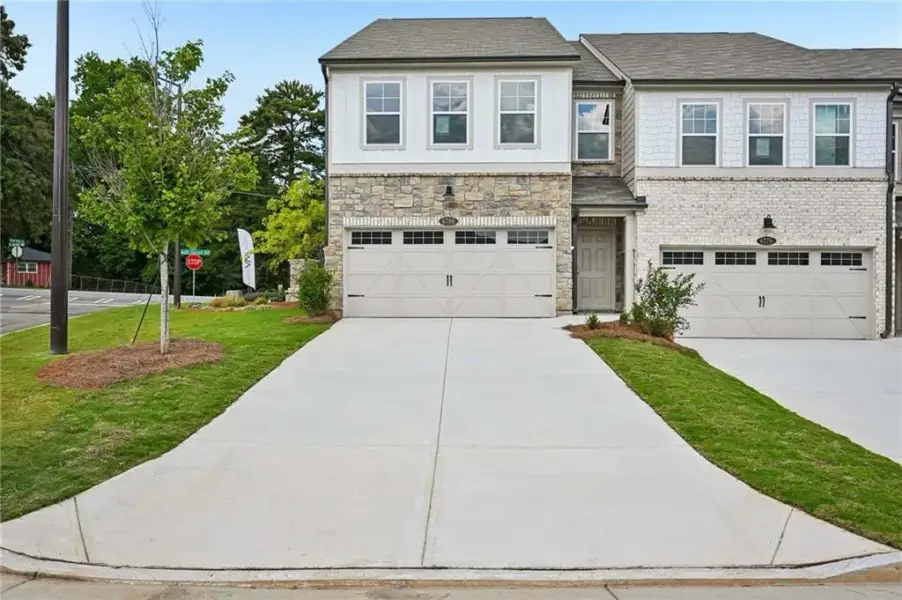 Front exterior of a new home in Leydenview, Mableton, GA, highlighting curb appeal (Image 2). Front exterior of a new home in Leydenview, Mableton, GA, highlighting curb appeal (Image 2).
