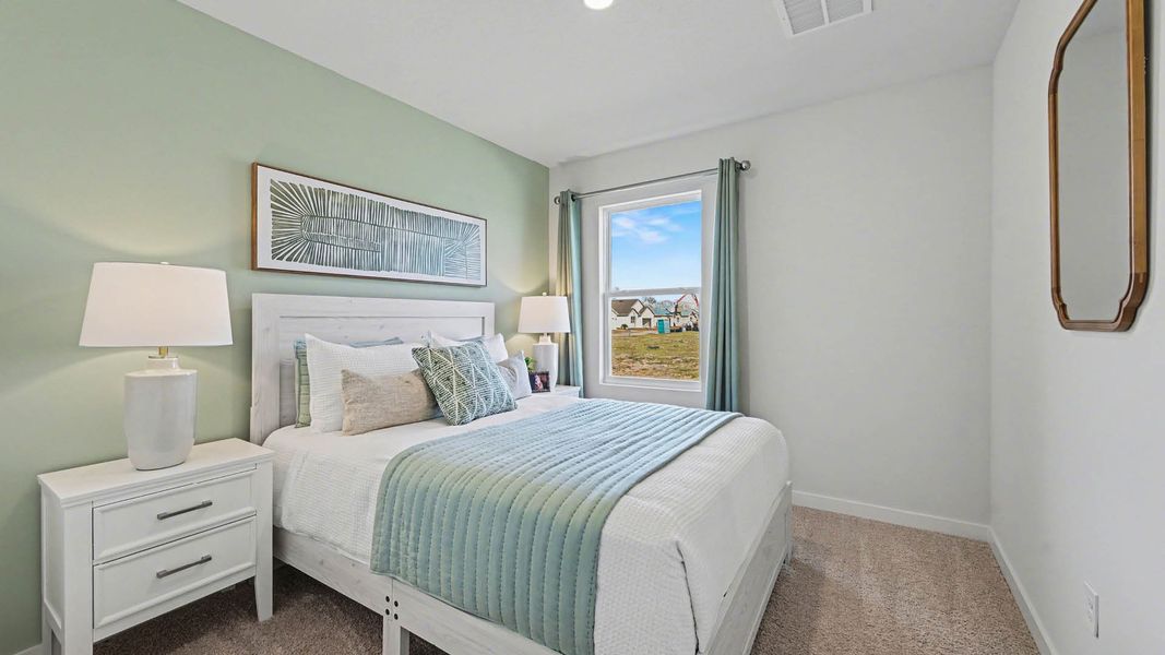 Representative furnished interior of a home built from the Harper by D.R. Horton in Venetian Grove, Vero Beach (Image 19).