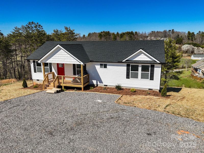Front exterior of a new home in , Weaverville, NC, highlighting curb appeal (Image 20). Front exterior of a new home in , Weaverville, NC, highlighting curb appeal (Image 20).