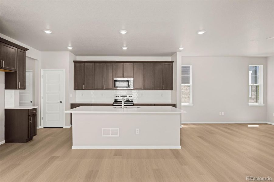 Furnished interior view inside a new home in Painted Prairie, Aurora (Image 5).