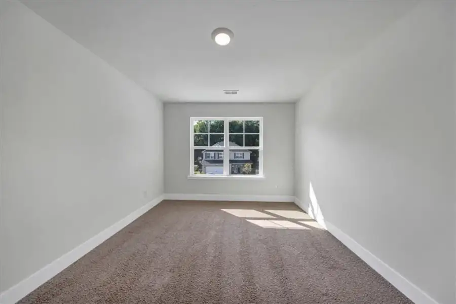 Spacious, unfurnished interior of a new home in Canterbury Villas, Carrollton (Image 35).