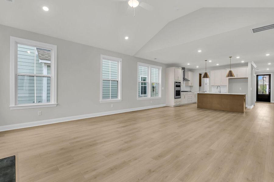 Spacious, unfurnished interior of a new home in Tidewater at Lakes of Cane Bay, Summerville (Image 31).