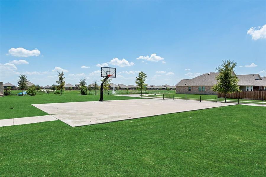 View of basketball court with a residential view and community basketball court View of basketball court with a residential view and community basketball court