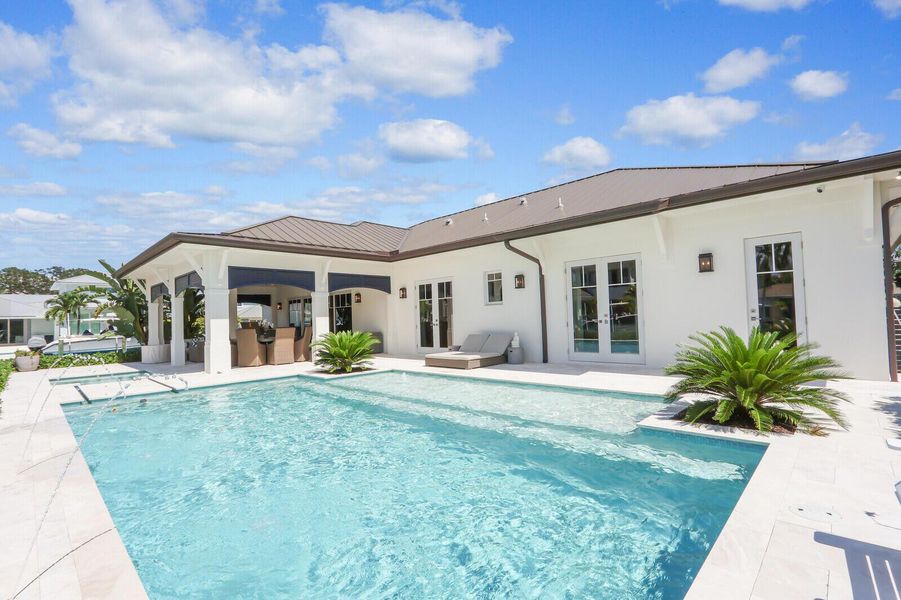 Exterior details and patio area of a home in , Jupiter (Image 21).