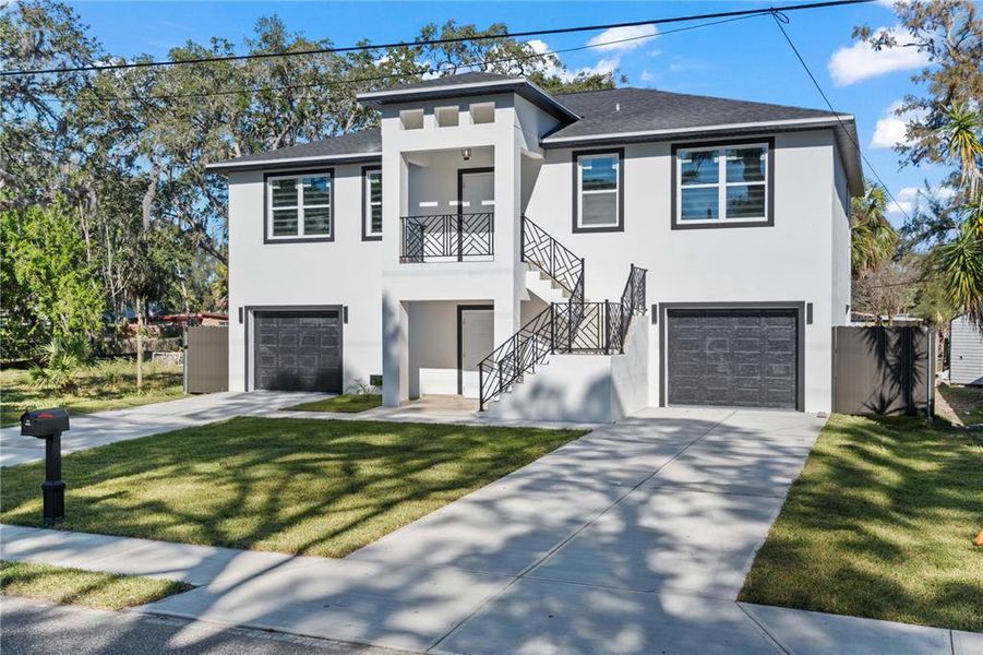 Front exterior of a new home in , New Port Richey, FL, highlighting curb appeal (Image 22).