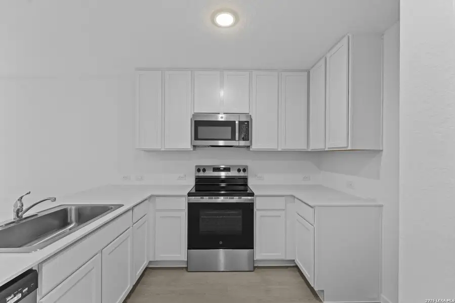 Furnished interior view inside a new home in Hidden Oasis, San Antonio (Image 9).