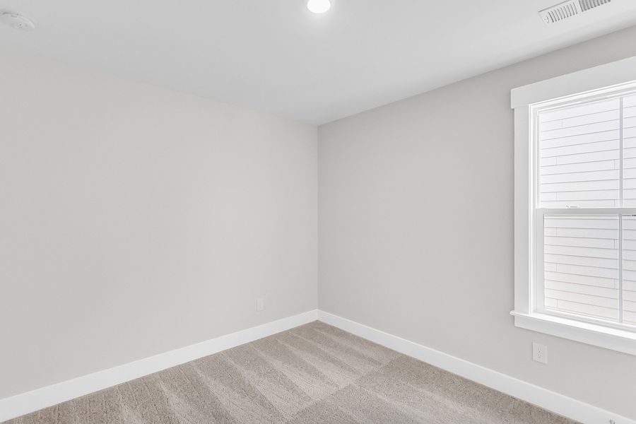 Spacious, unfurnished interior of a new home in Pineland Preserve, Summerville (Image 48).