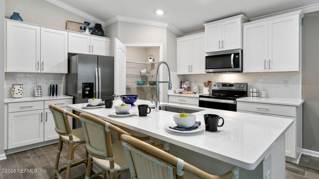 Furnished interior view inside a new home in Sawmill Branch, Palm Coast (Image 15).