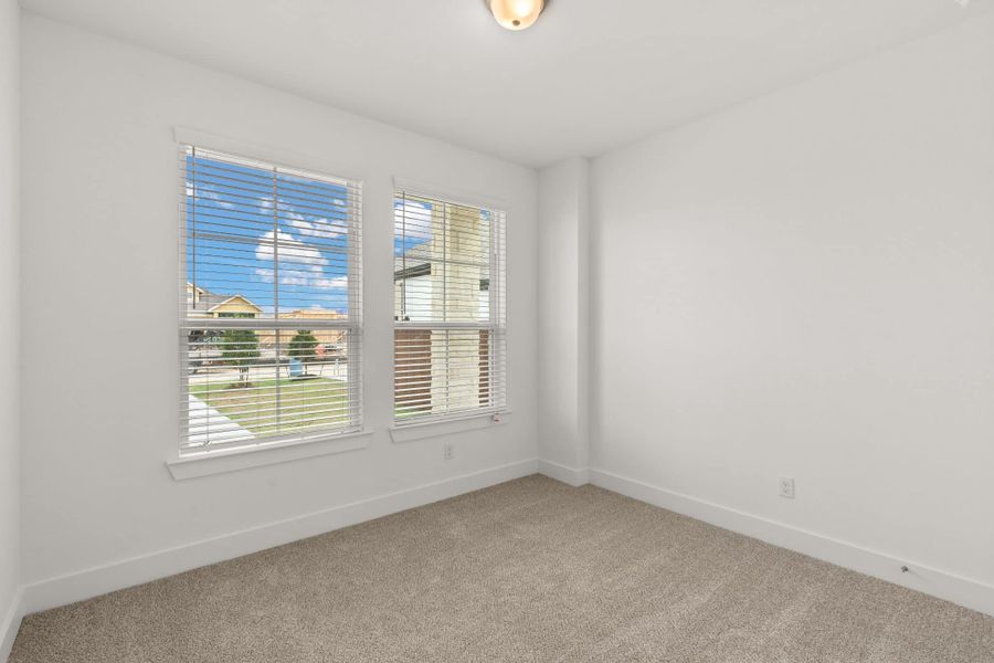 Spacious, unfurnished interior of a new home in Meridiana, Manvel (Image 15).