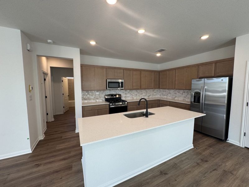 Furnished interior view inside a new home in Village at Three Oaks, Seguin (Image 8).
