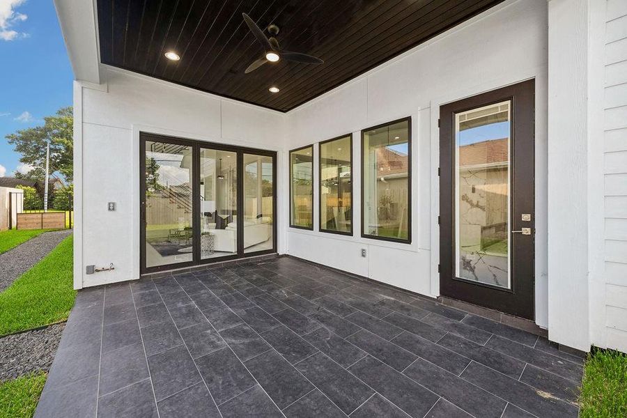 Exterior details and patio area of a home in , Houston (Image 3). Exterior details and patio area of a home in , Houston (Image 3).