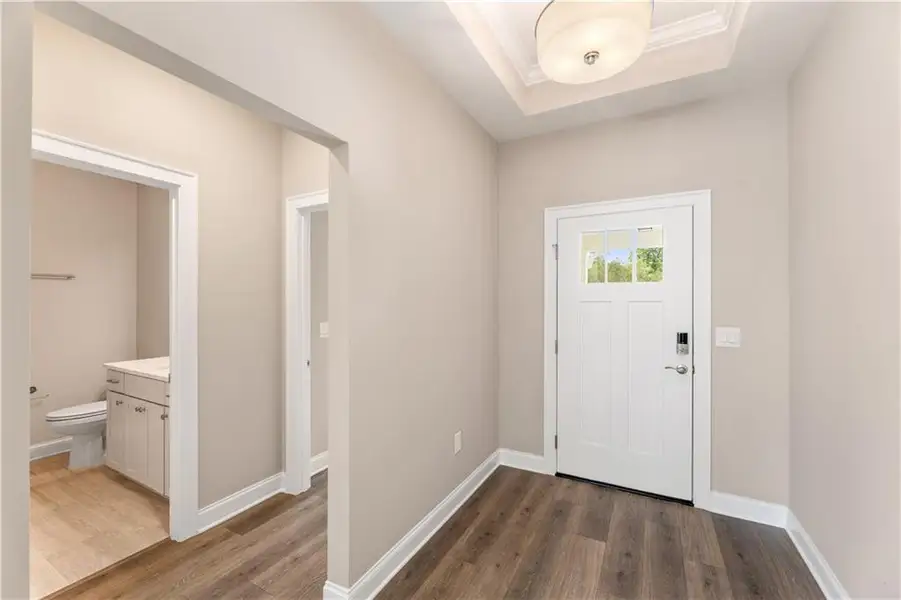 Spacious, unfurnished interior of a new home in The Courtyards at Bailey Farms, Dacula (Image 14).